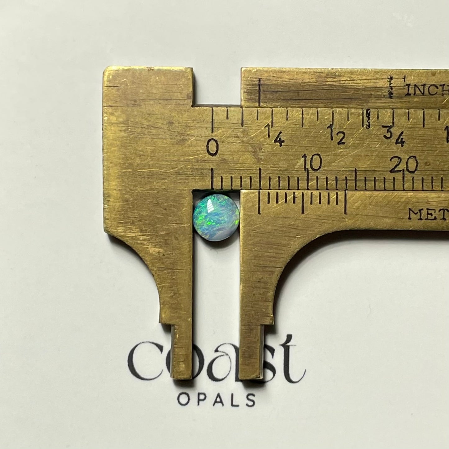 Calibrated - Pastel aqua round boulder opal