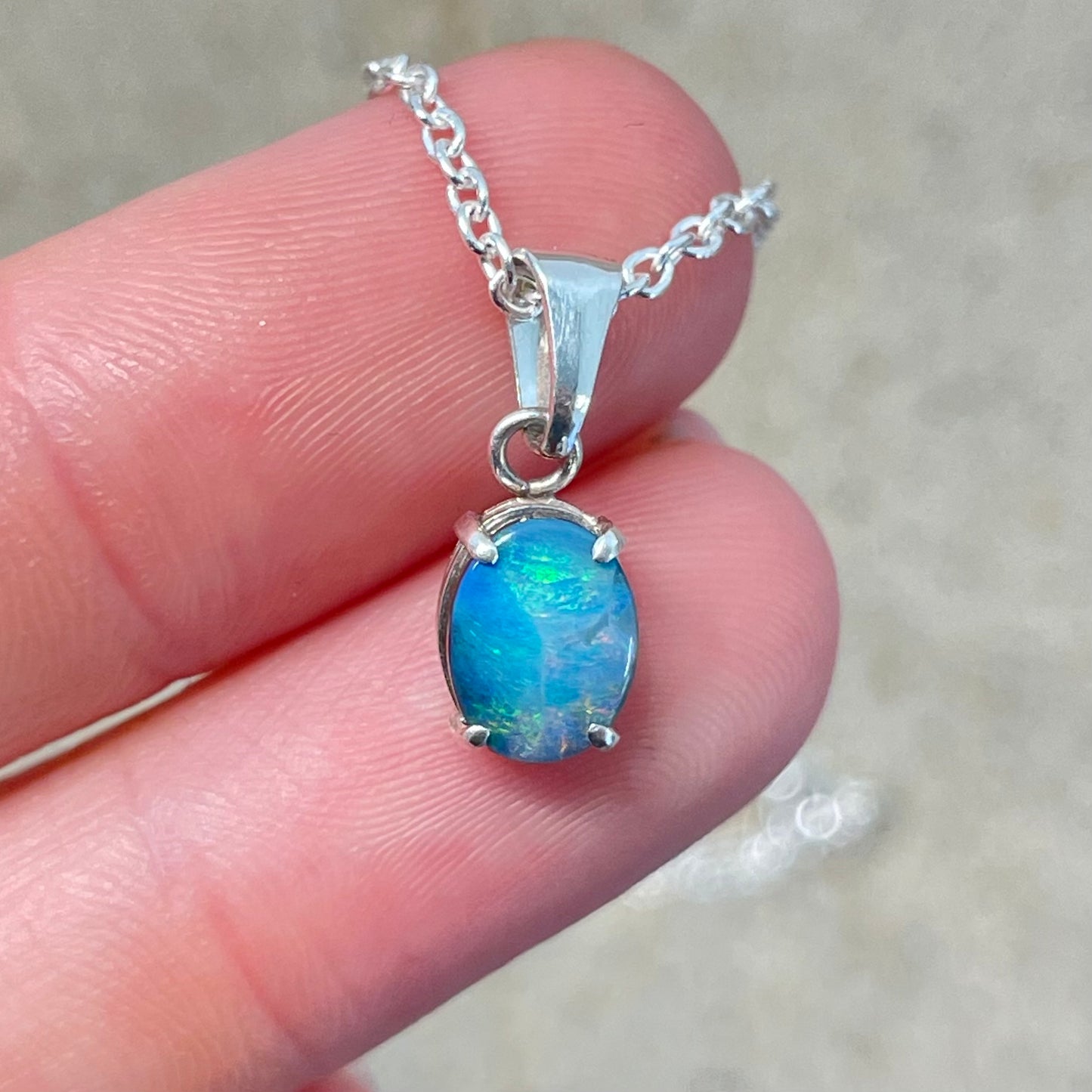 Aqua solid boulder opal pendant