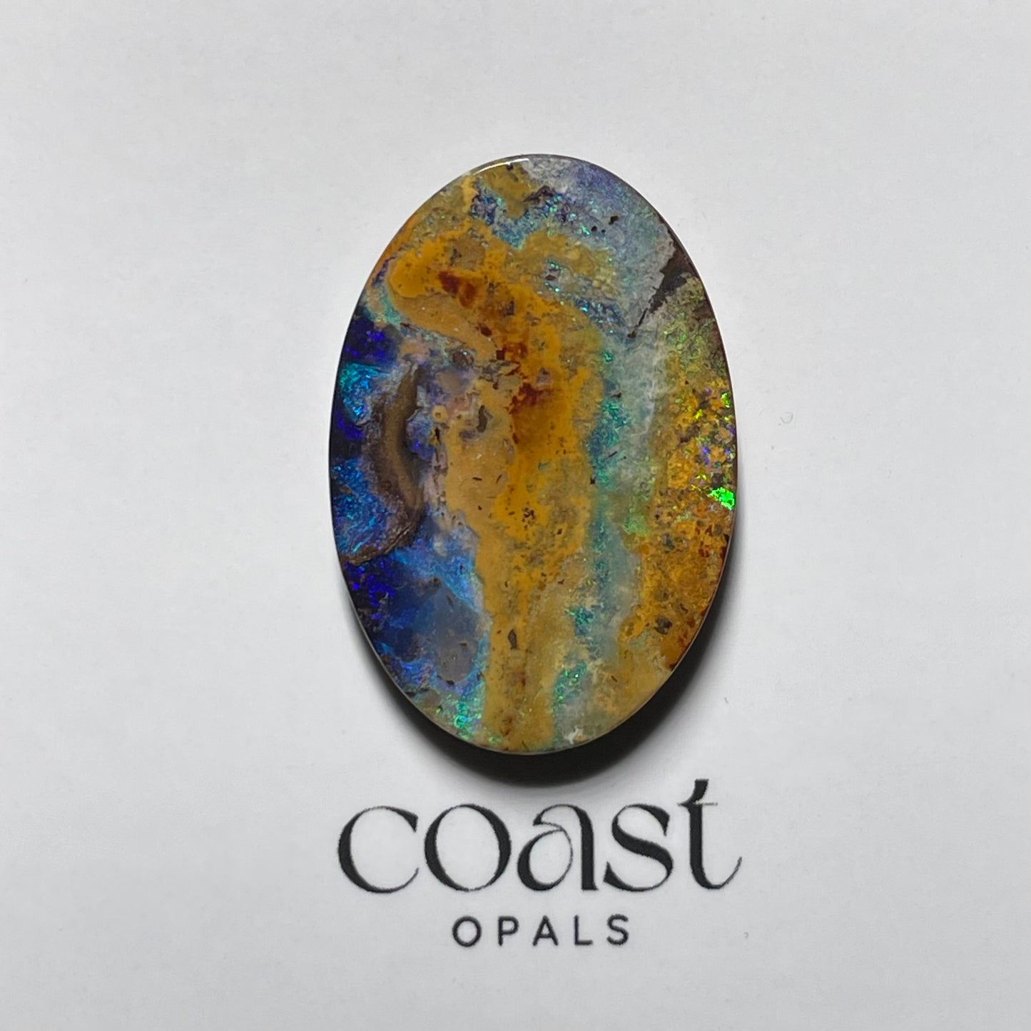 Freeform - Oval caramel-blue boulder opal