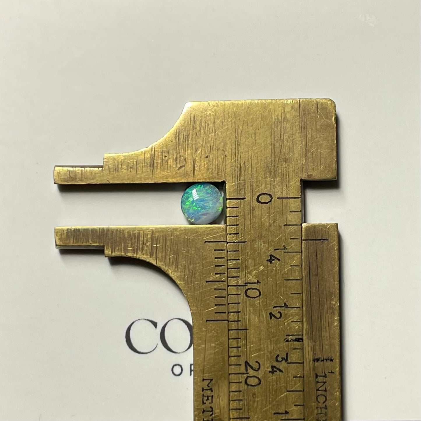 Calibrated - Pastel aqua round boulder opal