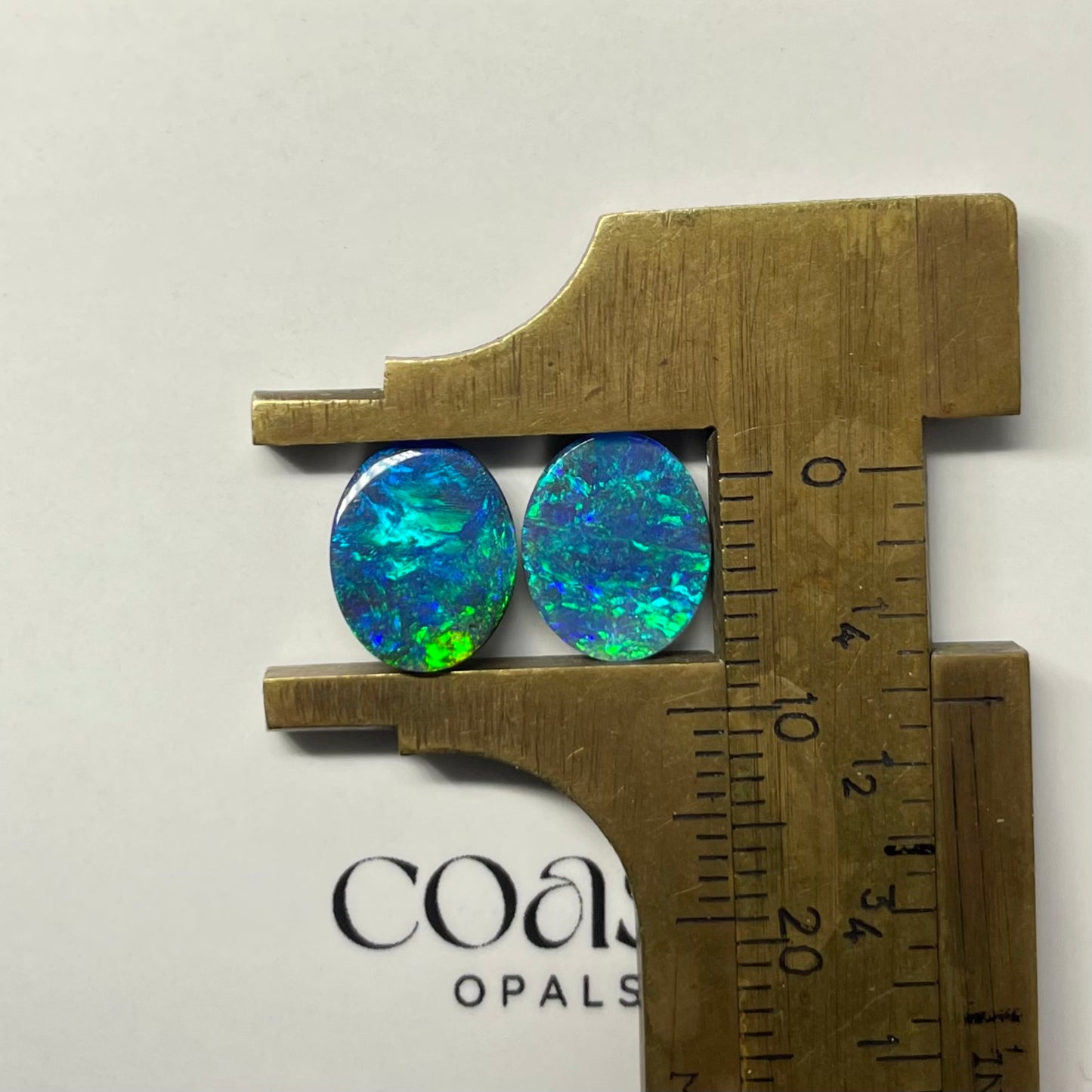 Electric blue-green boulder opal pair 4.62ct