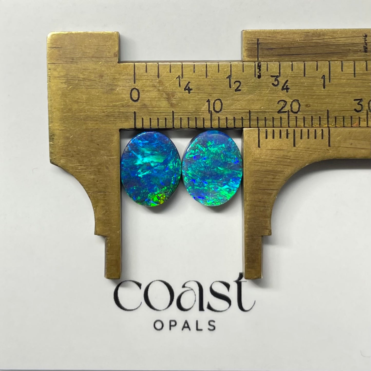 Electric blue-green boulder opal pair 4.62ct